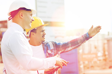 Image showing builder and architect with tablet pc outdoors