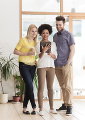 Image showing creative team with tablet pc and coffee at office