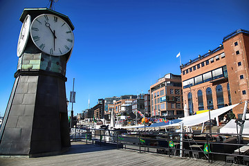 Image showing Clock tower on Aker Brygge Dock and modern building in Oslo, Nor