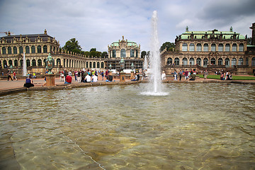 Image showing DRESDEN, GERMANY – AUGUST 13, 2016: Tourists walk and visit Dr