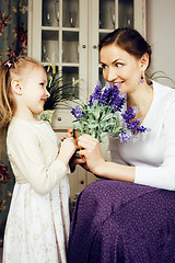 Image showing young mother with daughter at luxury home interior vintage