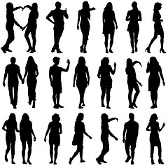 Image showing Black silhouettes of beautiful mans and womans on white