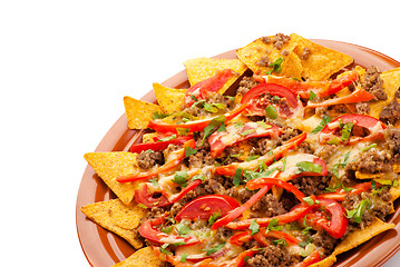 Image showing spicy nachos with pork, tomato and pepper