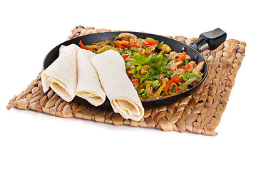 Image showing traditional mexican beef fajitas with tortillas