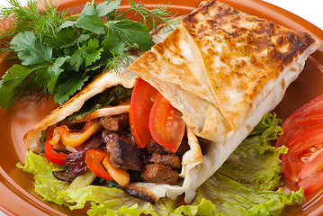 Image showing beef fajitas with peppers and tomato