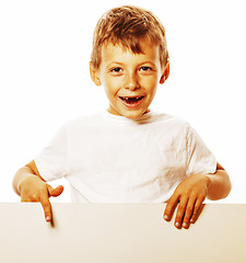 Image showing little cute boy holding empty shit to copyspace isolated close u