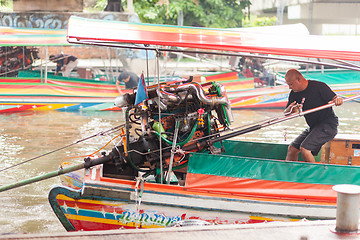 Image showing Long-tail boat man, Thailand