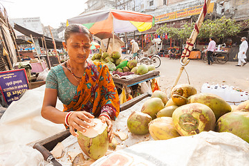 Image showing Coconut milk seller