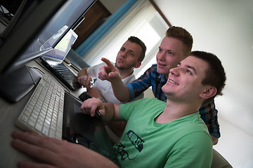 Image showing a group of graphic designers at work