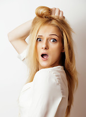 Image showing young blond woman on white backgroung gesture thumbs up, isolate