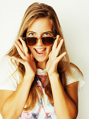 Image showing pretty young woman wearing sunglasses and summer hat, fashion pe