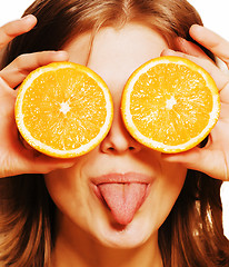 Image showing young pretty real blond woman with orange having fun, lifestyle 