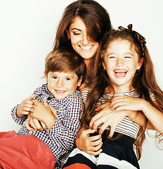 Image showing young mother with two children on white, happy smiling family in