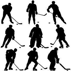 Image showing Set of silhouettes hockey player. Isolated on white.