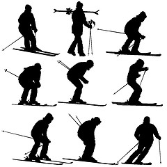 Image showing Set mountain skier speeding down slope. sport silhouette