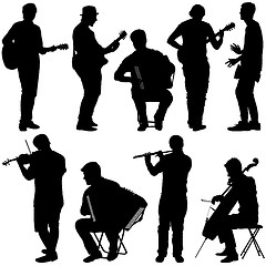 Image showing Silhouettes street musicians playing instruments. illustration