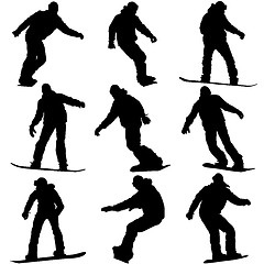 Image showing Set black silhouettes snowboarders on white background.
