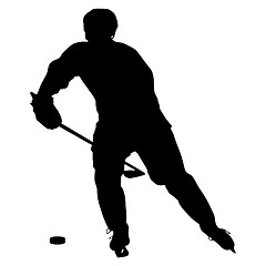 Image showing silhouette of hockey player. Isolated on white.