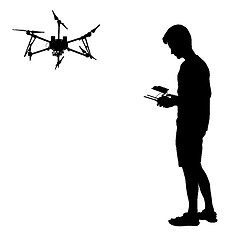 Image showing Black silhouette of a man operates unmanned quadcopter illustration