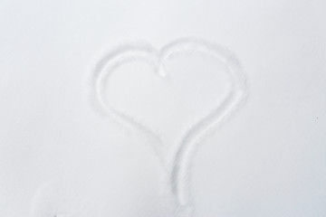 Image showing heart shape silhouette or print on snow surface