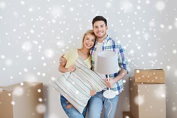 Image showing happy couple with stuff moving to new home