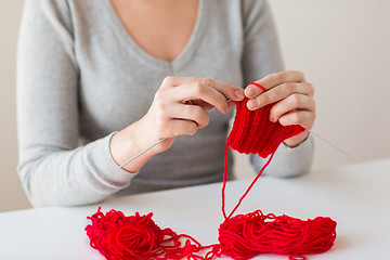 Image showing woman hands knitting with needles and yarn