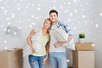 Image showing happy couple with stuff moving to new home