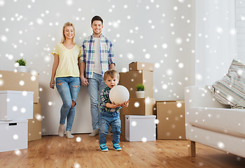 Image showing happy family moving to new home and playing ball