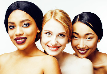 Image showing three different nation woman: asian, african-american, caucasian together isolated on white background happy smiling, diverse type on skin, lifestyle people concept