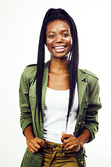 Image showing young pretty african-american girl posing cheerful emotional on white background isolated, lifestyle people concept