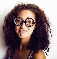 Image showing teenage bookworm concept, cute young woman in glasses, lifestyle people concept