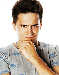 Image showing young handsome brunete man emotional posing on white background 