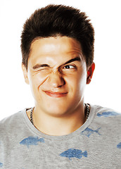 Image showing young handsome brunete man emotional posing on white background 