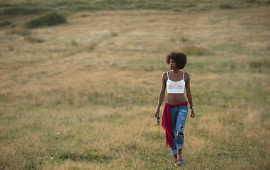 Image showing young black woman in nature