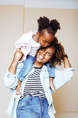 Image showing adorable sweet young afro-american mother with cute little daugh