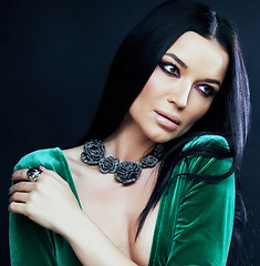 Image showing young pretty brunette woman fashion dressed, bright makeup, eleg