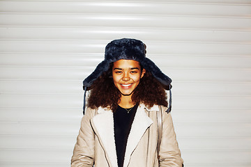 Image showing young pretty african american girl teenage outside on street, lo