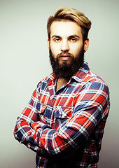 Image showing portrait of young bearded hipster guy smiling on white background close up, brutal man, lifestyle people concept