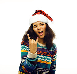 Image showing cute young real african hipster girl in santas red hat isolated 