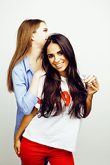 Image showing best friends teenage girls together having fun, posing emotional on white background, besties happy smiling, lifestyle people concept, blond and brunette multi nations