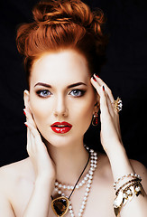 Image showing beauty stylish redhead woman with hairstyle and manicure wearing