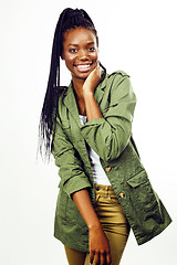 Image showing young pretty african-american girl posing cheerful emotional on white background isolated, lifestyle people concept