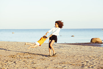 Image showing pretty diverse nation and age friends on sea coast having fun, lifestyle people concept on beach vacations