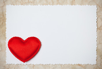 Image showing Red hearts on a blank photo paper