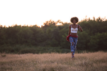 Image showing young black woman in nature