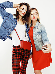 Image showing best friends teenage girls together having fun, posing emotional on white background, besties happy smiling, lifestyle people concept