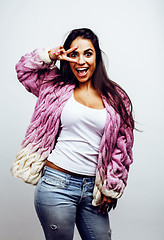 Image showing young happy smiling latin american teenage girl emotional posing on white background, lifestyle people concept