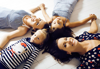 Image showing Mature sisters twins at home with little daughter, happy family 