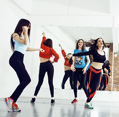 Image showing Women doing sport in gym, healthcare lifestyle people concept, modern loft studio