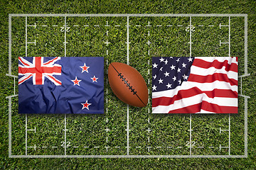 Image showing New Zealand vs. USA flags on rugby field